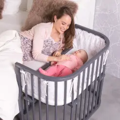 Maxi Comfort Plus avec bébé 2.png